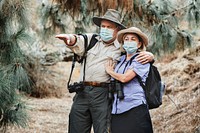 Active senior couple enjoying the beauty of nature during covid-19 pandemic