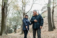 Lovely grandpa taking his blind wife for a walk 