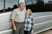 Happy couple travel with camper van in the new normal