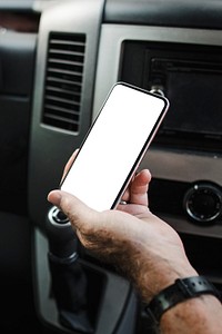 Grandpa showing his smartphone with car stereo background