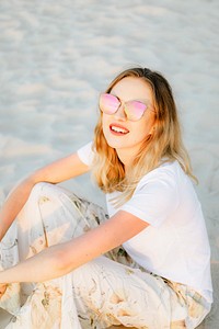 Woman in a casual summer outfit at the beach