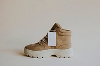 Blank label on brown suede high top sneakers