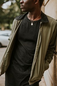 Men's green jacket mockup with black tee on African American model