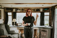 Woman with a coffee cup mockup in a cabin