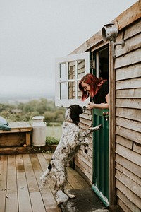 Woman playing with her dog