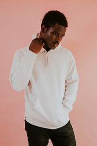 Black man in white hoodie mockup on pink background