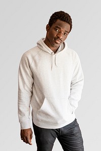 Men&#39;s white hoodie mockup on black model psd in studio