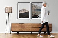 Picture frame wall mockup psd with tv cabinet in a Scandinavian decor living room