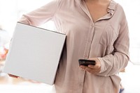 Woman carrying delivery box lifestyle concept