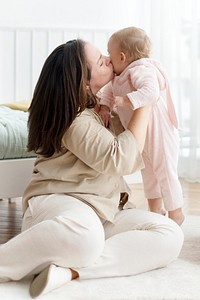 Mother and toddler playing together