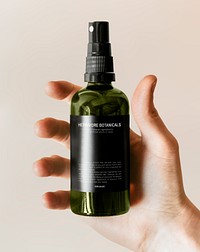 Green herbal spray bottle psd