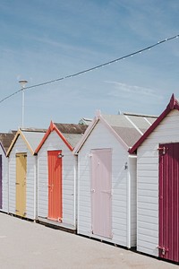 Pastel beach huts by the beach 