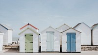 Desktop wallpaper background, pastel beach huts by the beach