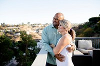 Husband and wife relaxing on their rooftop during covid-19 lockdown