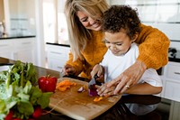 Family cooking breakfast together at home