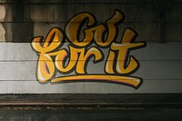 Go for it graffiti on the grunge wall under the bridge background image