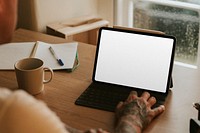 Man working on tablet screen mockup psd digital device