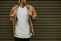 Blonde man in brown shirt jacket with design space 