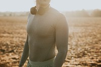 Man with  headphones around his neck closeup