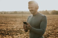 Cool man listening to music wearing wireless headphones