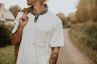 Man with mustache wearing white t-shirt with design space