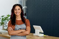 Woman mockup psd small business owner at a cash register