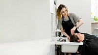 Woman getting a hair wash at a beauty salon