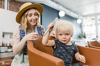 Kid getting a haircut 