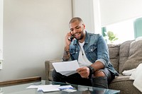 Happy man paying bills, HD stock image