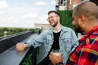 Happy man having cocktail while on a date