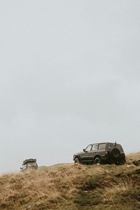 SUV cars off roading in nature