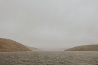 Peaceful lake water in a gloomy weather