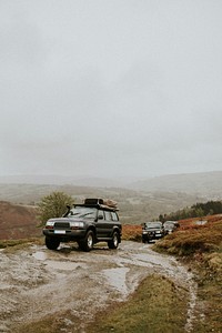 Cars driving through the off-roading path