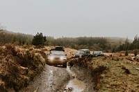 Cars driving through the off-roading path