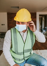 Contractor remodeling a home in the new normal