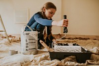 Kid helps remodelling home interior