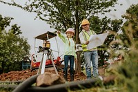 Playful daugther and dad at a construction site