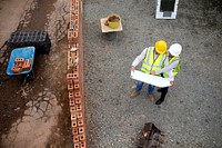 Woman and man contractor working together