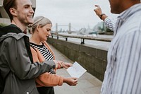 Travelers asking a local for direction 