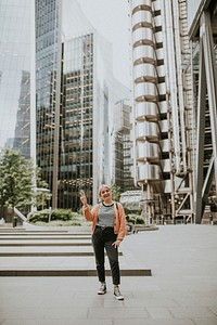 Woman holding a peace gesture 