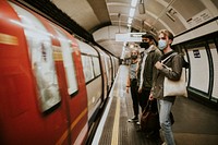 Passengers waiting for a train on a platform 