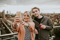 Friends taking a group selfie