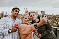 Friends taking a group selfie