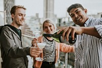Friends celebrating on a rooftop