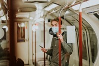 Man using a phone on a train in the new normal 