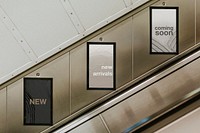 Billboard screens by underground escalator