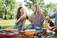 Friends having a picnic in the park