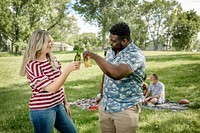 Friends having a picnic in the park