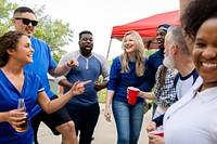 Friends partying at a tailgate event