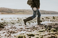 Tourist walking through the beach side trail in Wales 